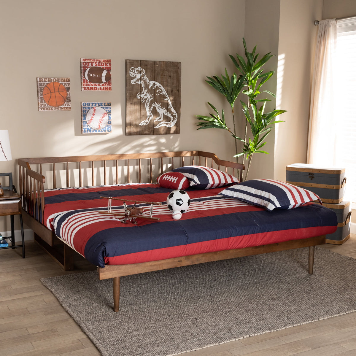 Eden Tali walnut expandable spindle daybed in a bedroom setting