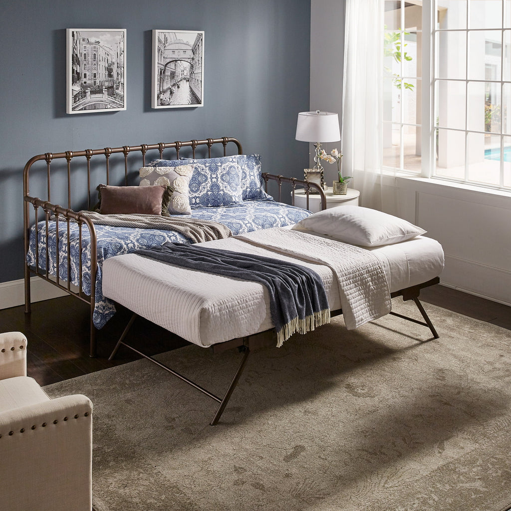 Eden Tali metal twin daybed with lift-up trundle in a bedroom setting