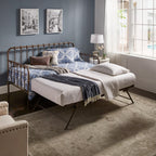 Eden Tali metal twin daybed with lift-up trundle in a bedroom setting
