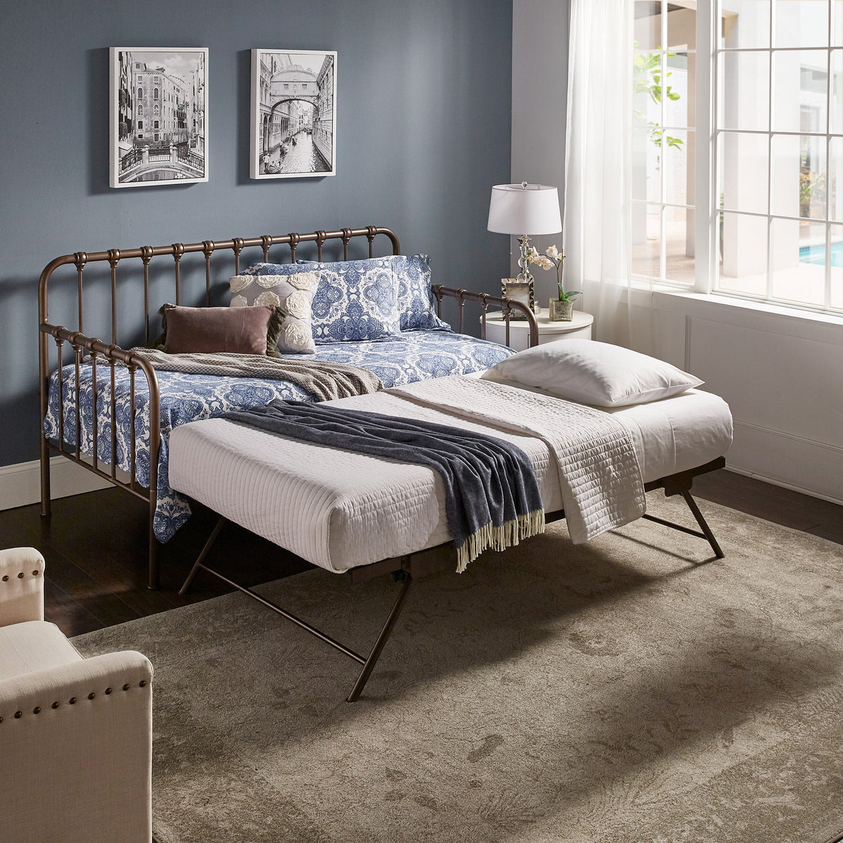 Eden Tali metal twin daybed with lift-up trundle in a bedroom setting
