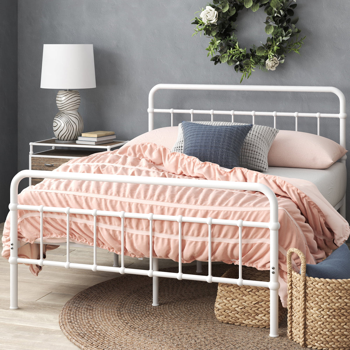 Eden Tali curved spindle steel platform bed in a bedroom setting